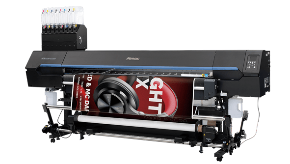 Mimaki TX330-1800 hybrid fabric printer producing a high-resolution red and black promotional graphic on roll media.